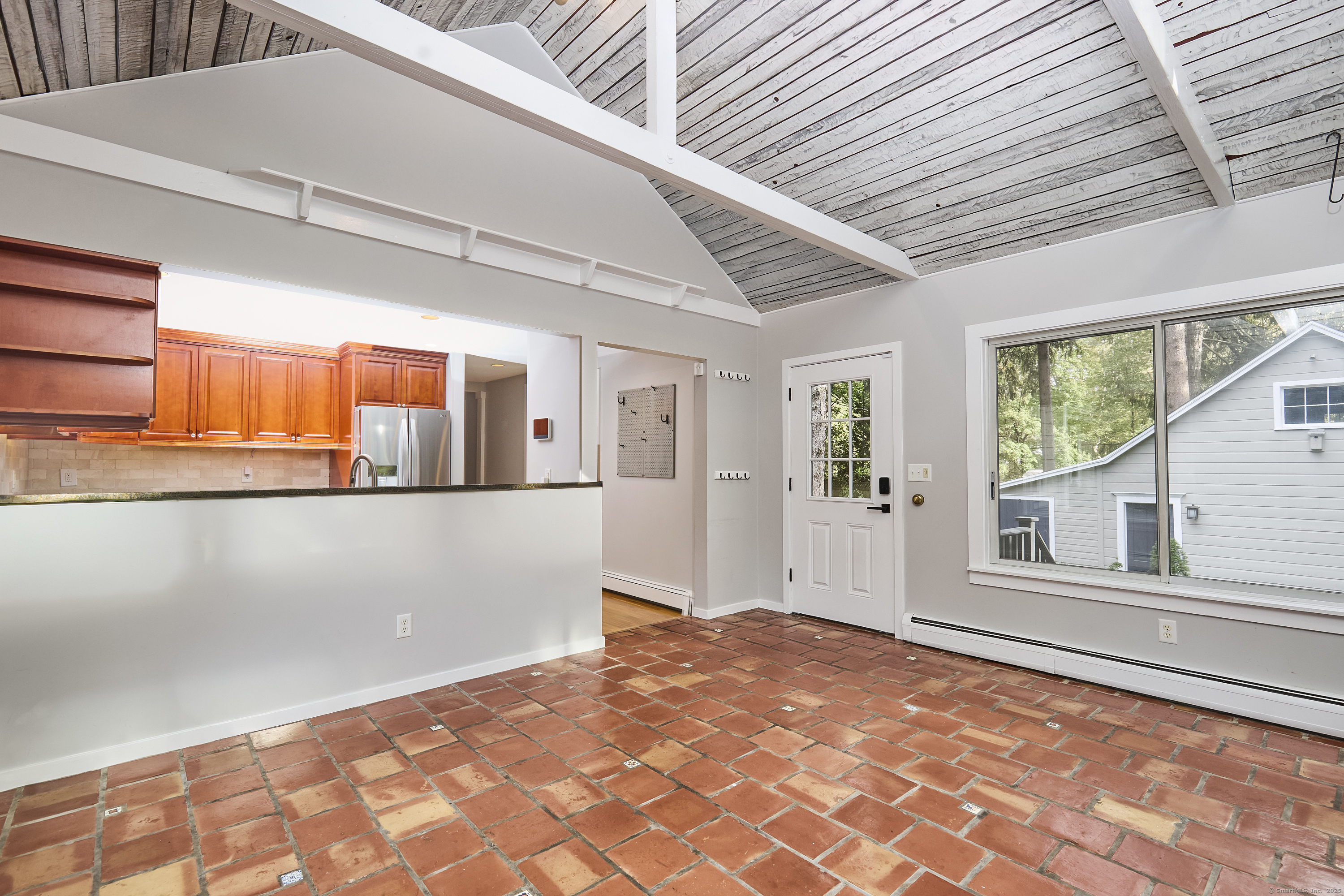 4 Colony Road Weston, CT 06883 - Photo 8 of 39 a view of a room with a large window