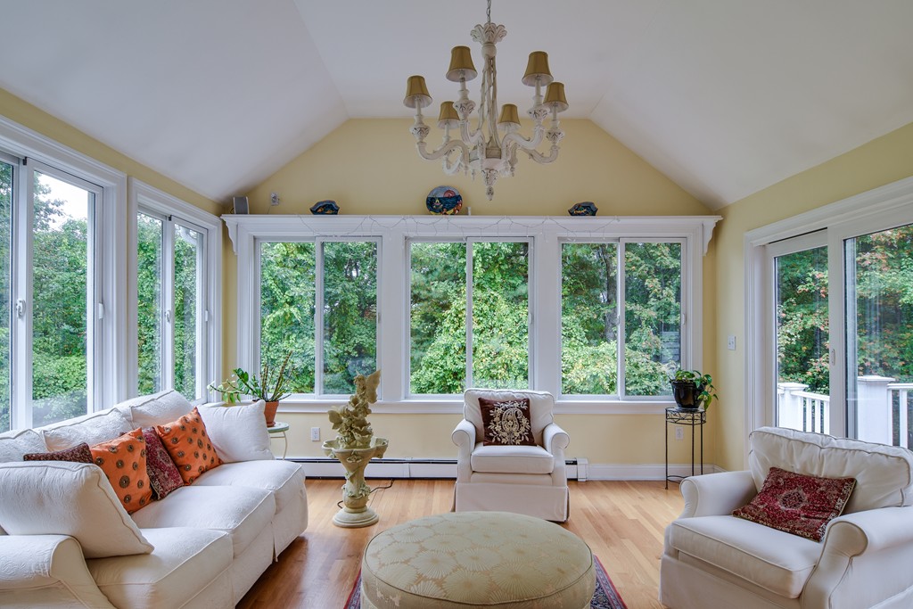 16 Tower Drive Dover, MA 02030 - Photo 16 of 42 a living room with furniture and a large window