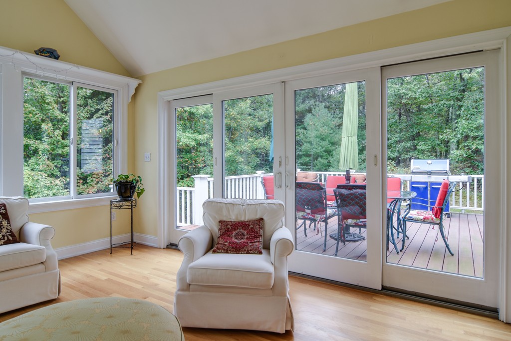16 Tower Drive Dover, MA 02030 - Photo 17 of 42 a living room with furniture and a large window