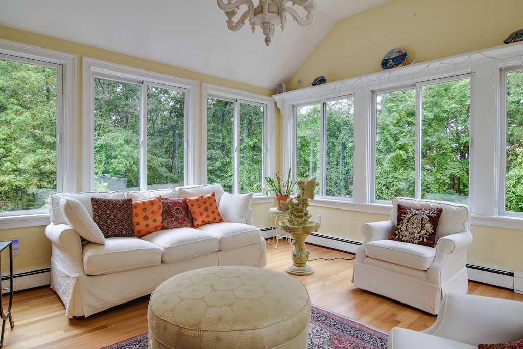 16 Tower Drive Dover, MA 02030 - Photo 18 of 42 a living room with furniture and a large window