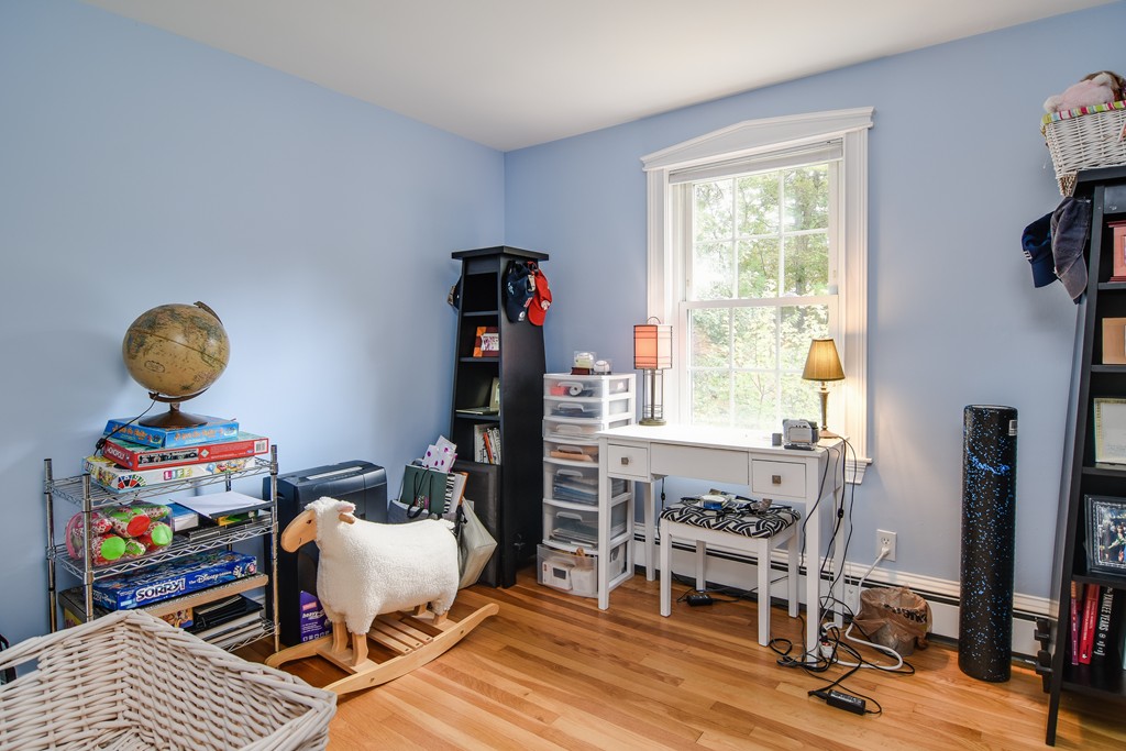 16 Tower Drive Dover, MA 02030 - Photo 20 of 42 a view of a workspace with furniture and a window