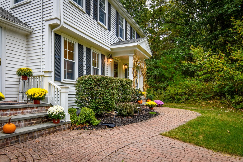 16 Tower Drive Dover, MA 02030 - Photo 2 of 42 a front view of a house with sitting area