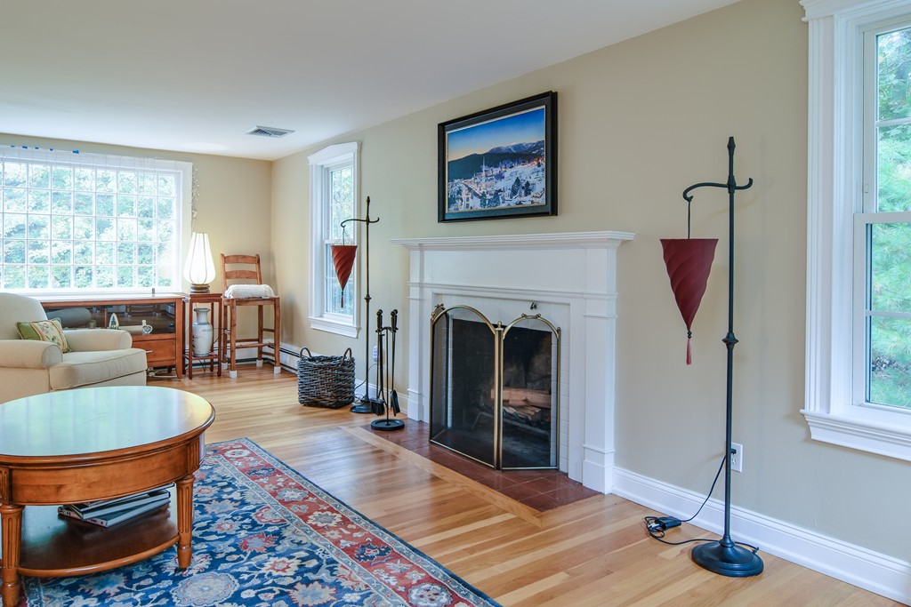 16 Tower Drive Dover, MA 02030 - Photo 7 of 42 a living room with furniture and a fireplace