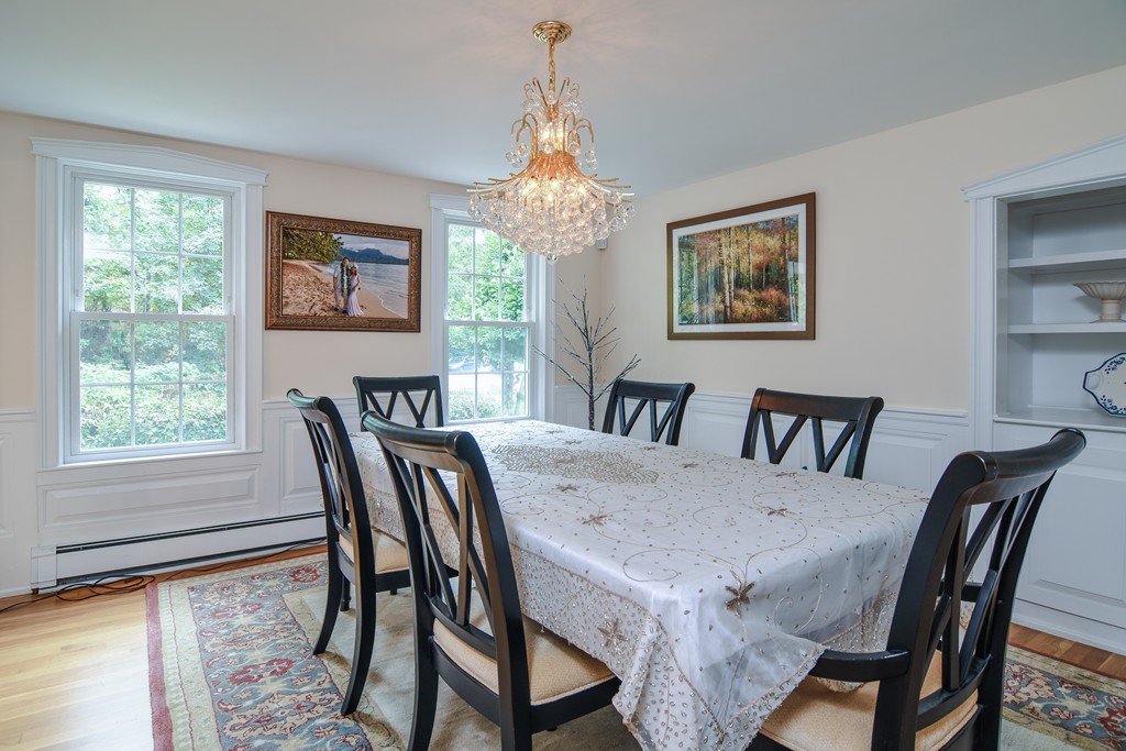 16 Tower Drive Dover, MA 02030 - Photo 8 of 42 a view of a dining room with furniture window and outside view