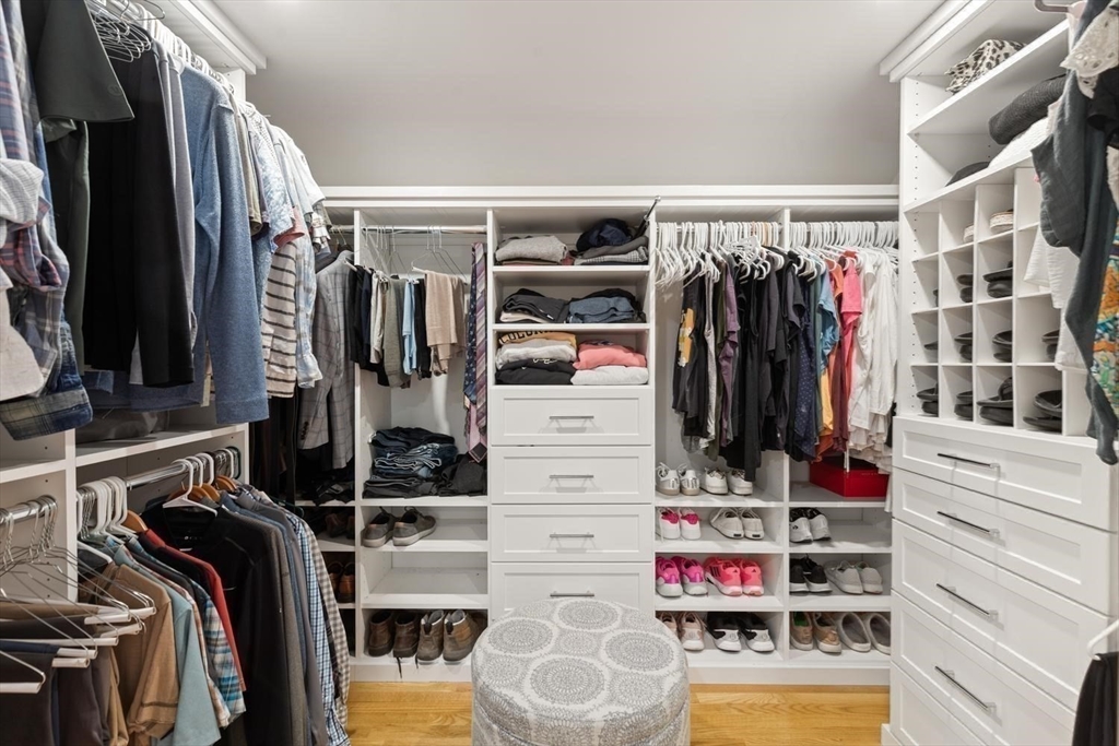 105 Thornberry Road Winchester, MA 01890 - Photo 19 of 35 a view of walk in closet with clothes and shoes