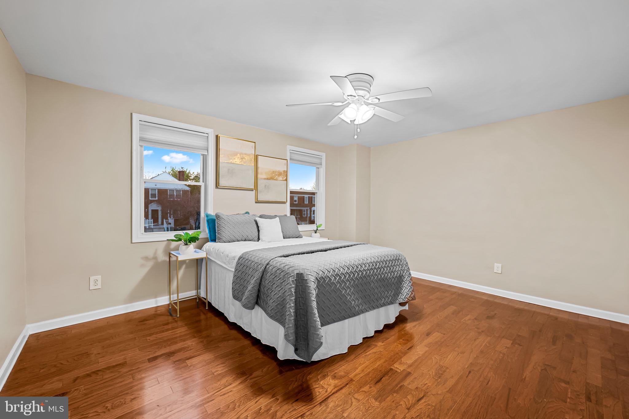 1817 Dunmere Road Baltimore, MD 21222 - Photo 19 of 27 a spacious bedroom with a bed and window