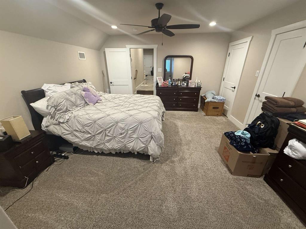 125 Lucky Ridge Lane Boyd, TX 76023 - Photo 7 of 29 Carpeted bedroom featuring recessed lighting, vaulted ceiling, and a ceiling fan