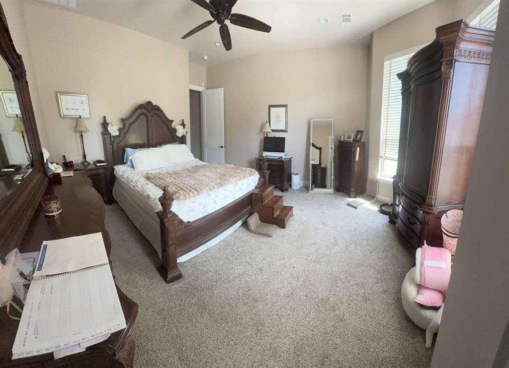 125 Lucky Ridge Lane Boyd, TX 76023 - Photo 8 of 29 Carpeted bedroom with a ceiling fan and recessed lighting