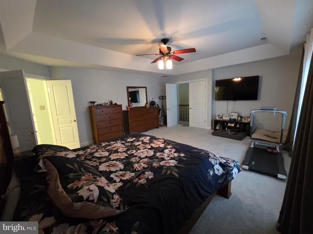 a bathroom with a sink toilet and mirror