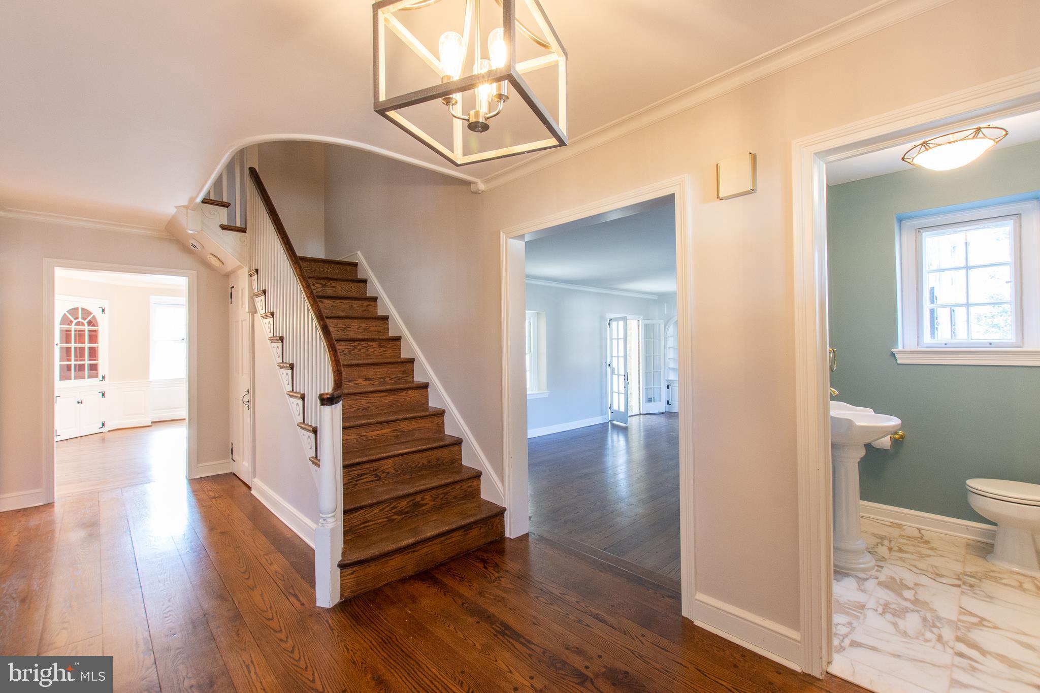 906 Overbrook Road Wilmington, DE 19807 - Photo 4 of 40 Front Foyer and Powder Room