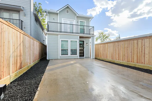 a view of a brick house in front of a brick house