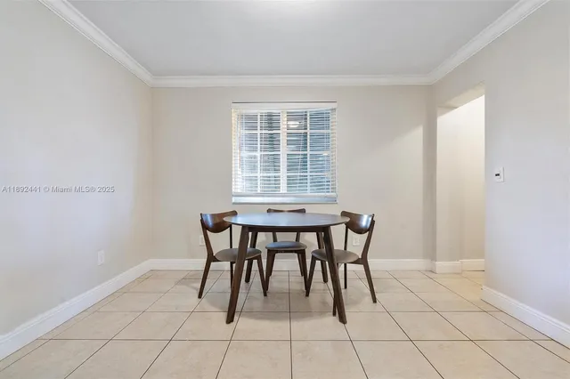 a kitchen with stainless steel appliances granite countertop a stove top oven a sink dishwasher and a refrigerator