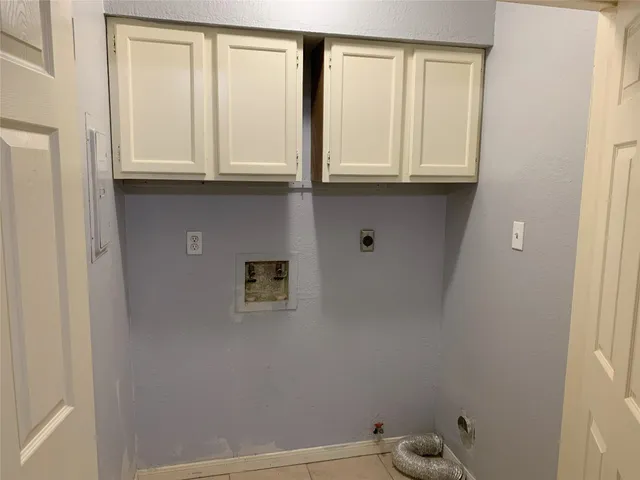 a bathroom with a sink and a window