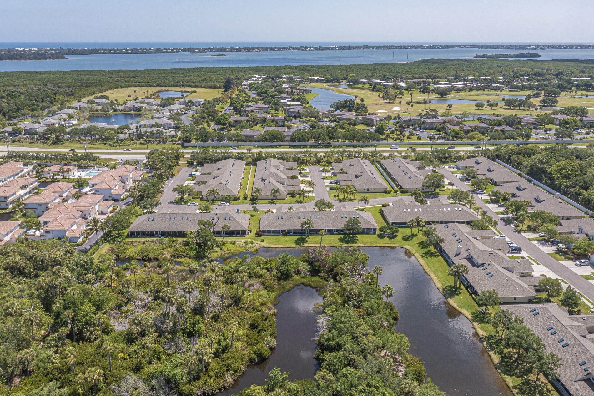a view of a city with an ocean