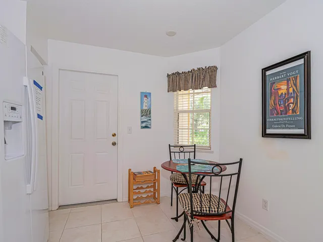 a view of a livingroom with furniture and windows