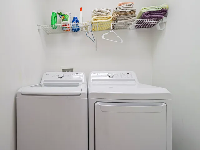 a utility room with dryer and washer