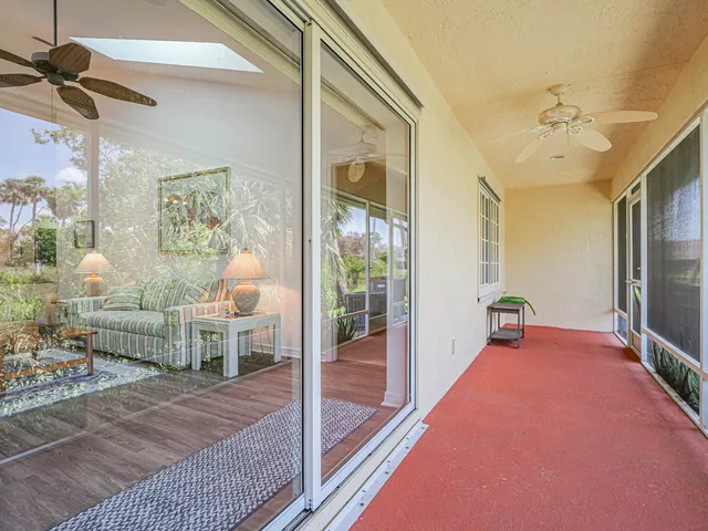 a bed room with a bed and a chandelier