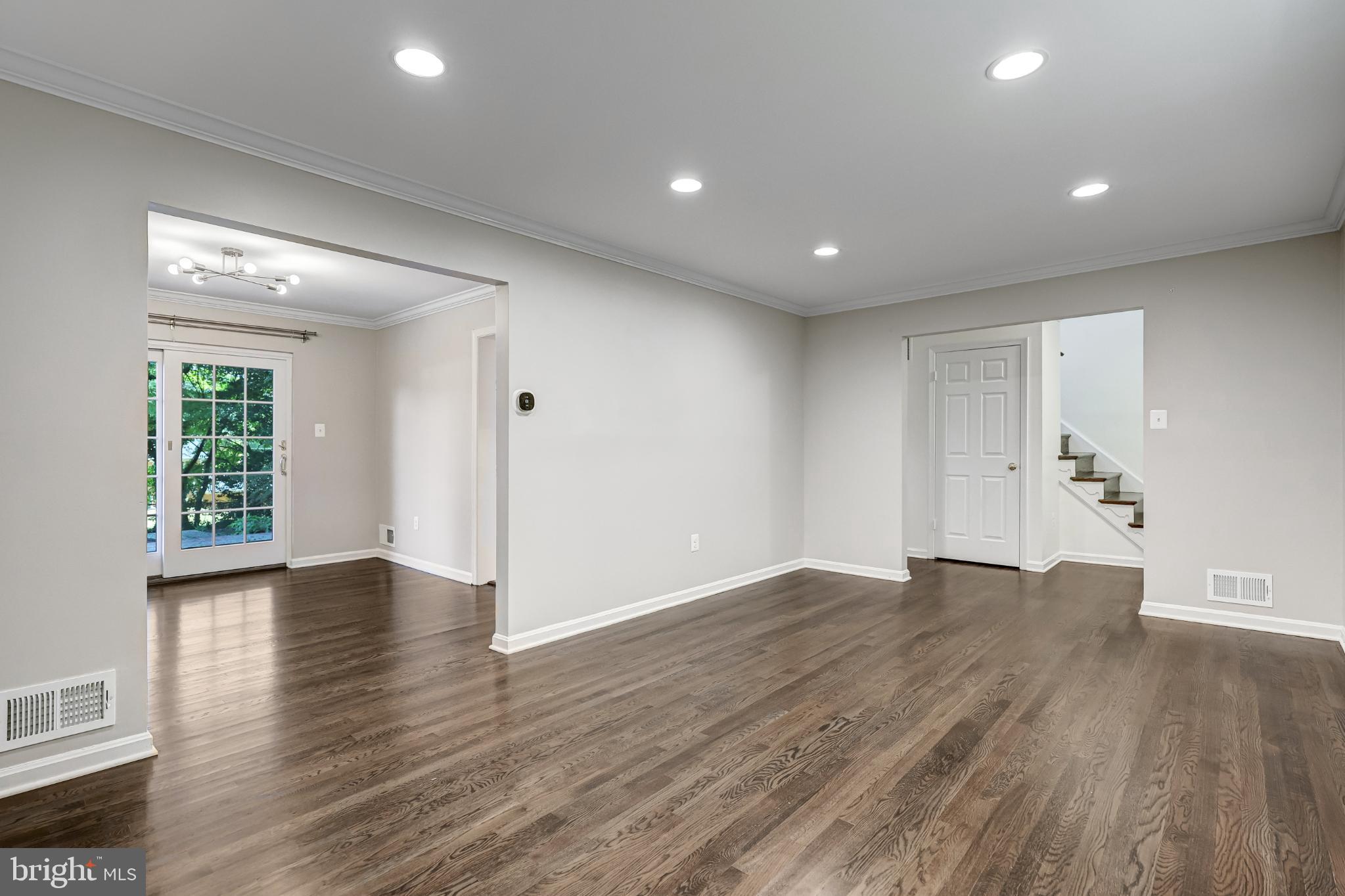 5609 Rolling Road Springfield, VA 22151 - Photo 12 of 42 Spacious, light-filled living area awaits you.