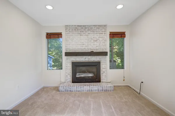 a living room with a fireplace in it
