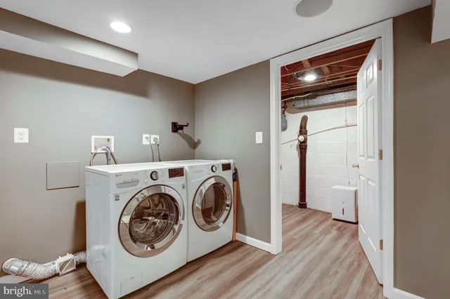 a utility room with dryer and washer