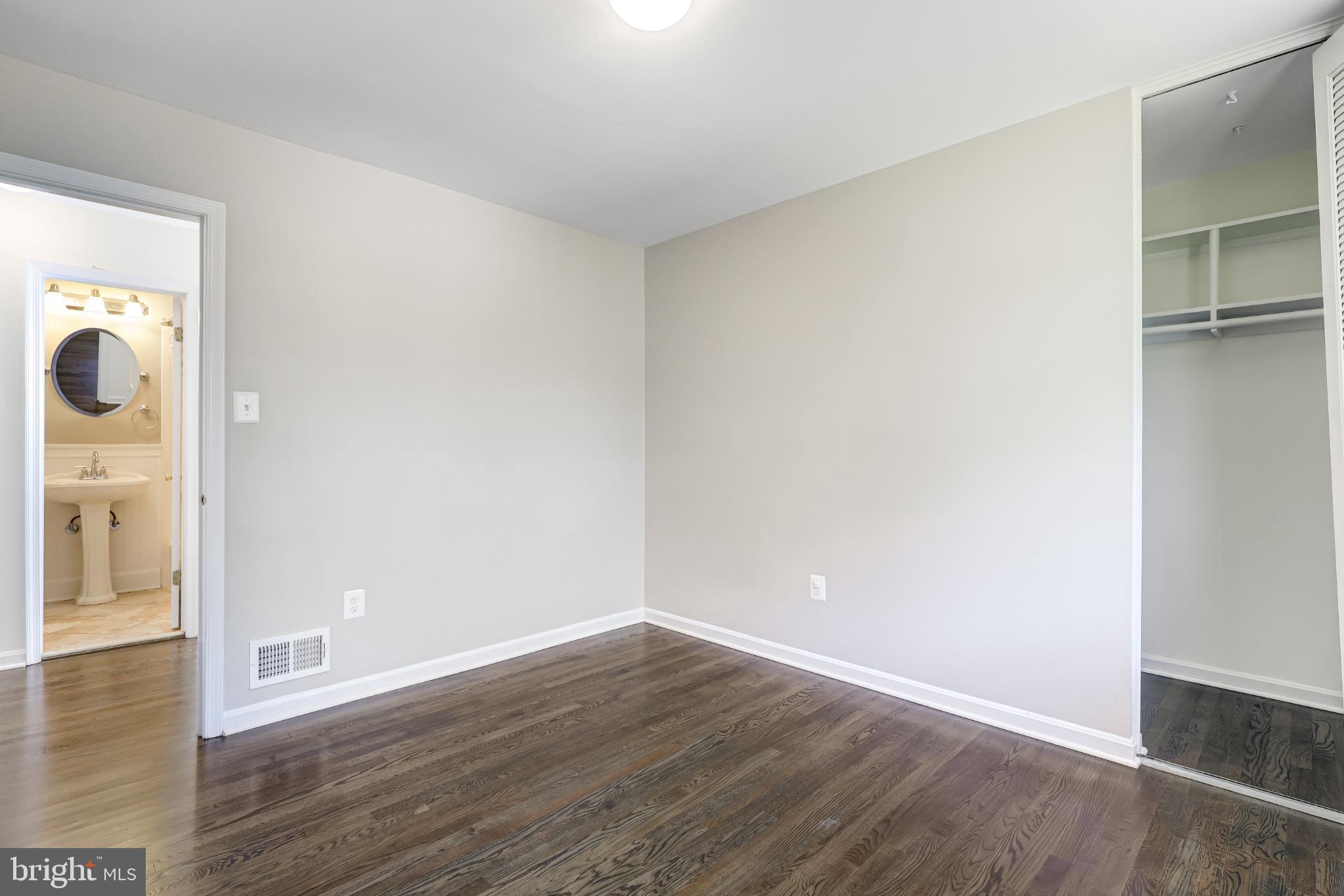 5609 Rolling Road Springfield, VA 22151 - Photo 29 of 42 Bright and airy room with hardwood floors.