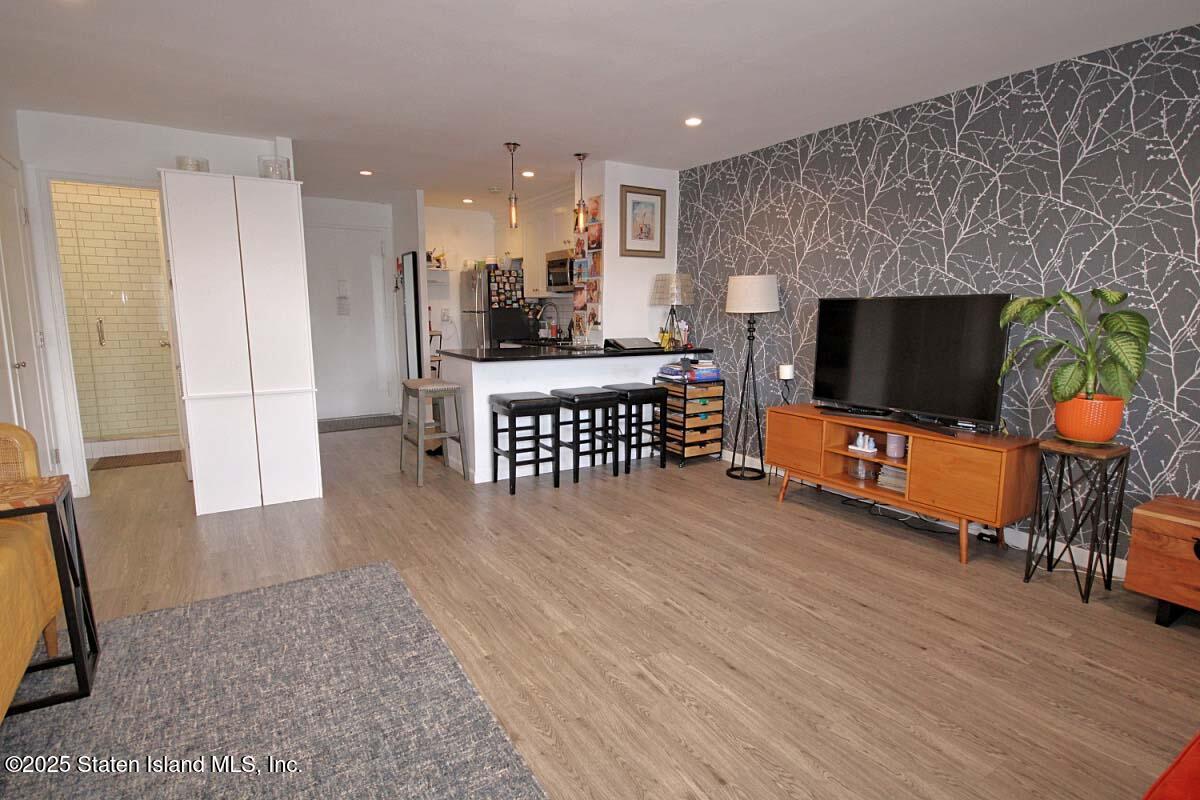 1000 Clove Road, Unit 7G Staten Island, NY 10301 - Photo 4 of 16 a view of a living room