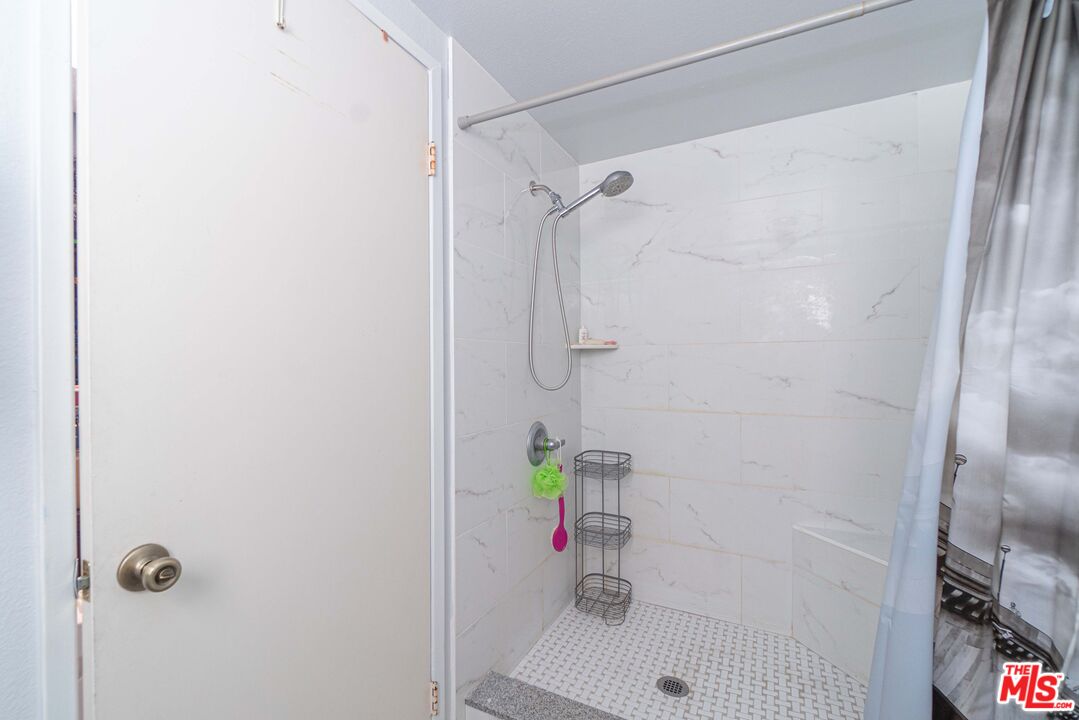 724 Anzac Circle Compton, CA 90220 - Photo 13 of 16 a bathroom with a shower