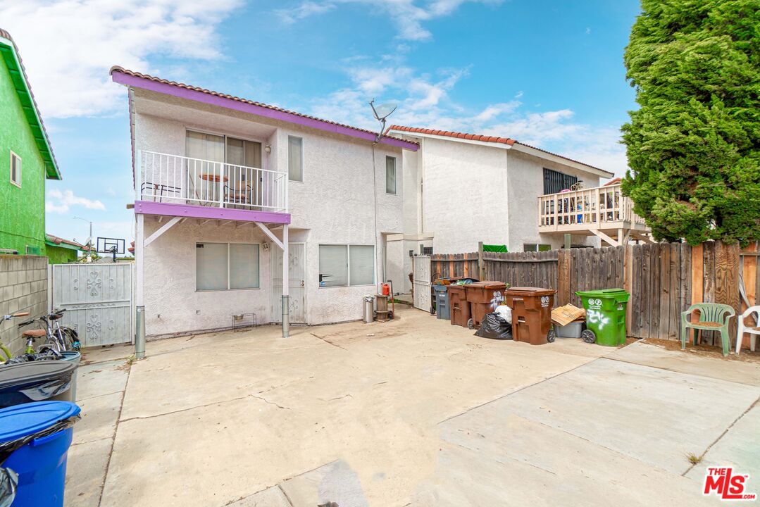 724 Anzac Circle Compton, CA 90220 - Photo 16 of 16 a view of a house with patio and sitting area