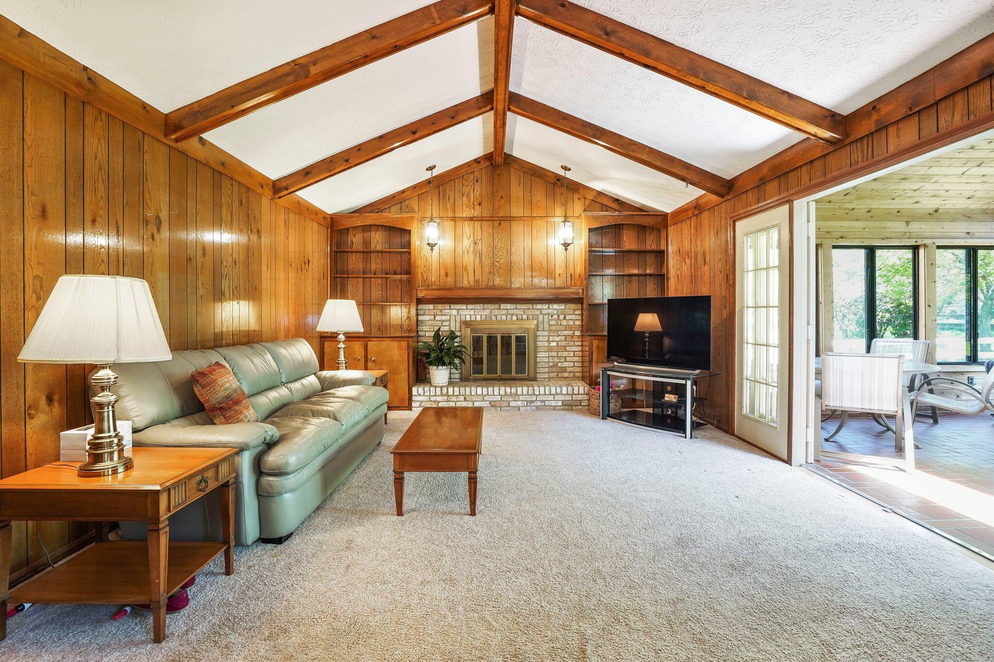 1180 Chatham Ridge Road Westerville, OH 43081 - Photo 31 of 69 Large family room with fireplace with beamed vaulted ceilings
