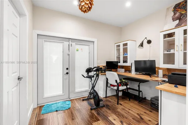 a bedroom with a bed and a couch