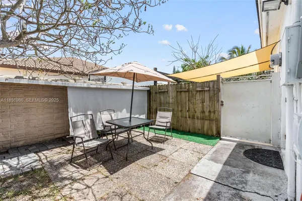 a white refrigerator freezer sitting in a kitchen