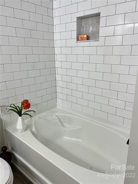 1415 Miles Road Dallas, NC 28034 - Photo 19 of 23 a bathroom with a sink and a bathtub