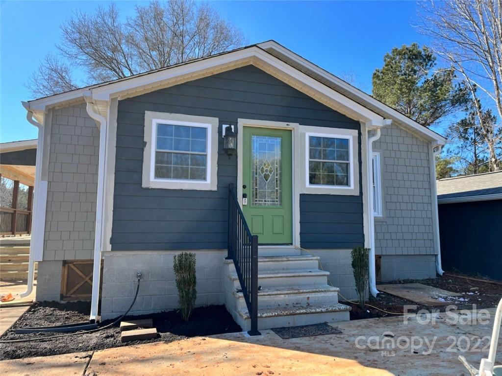 1415 Miles Road Dallas, NC 28034 - Photo 5 of 23 a front view of a house with stairs