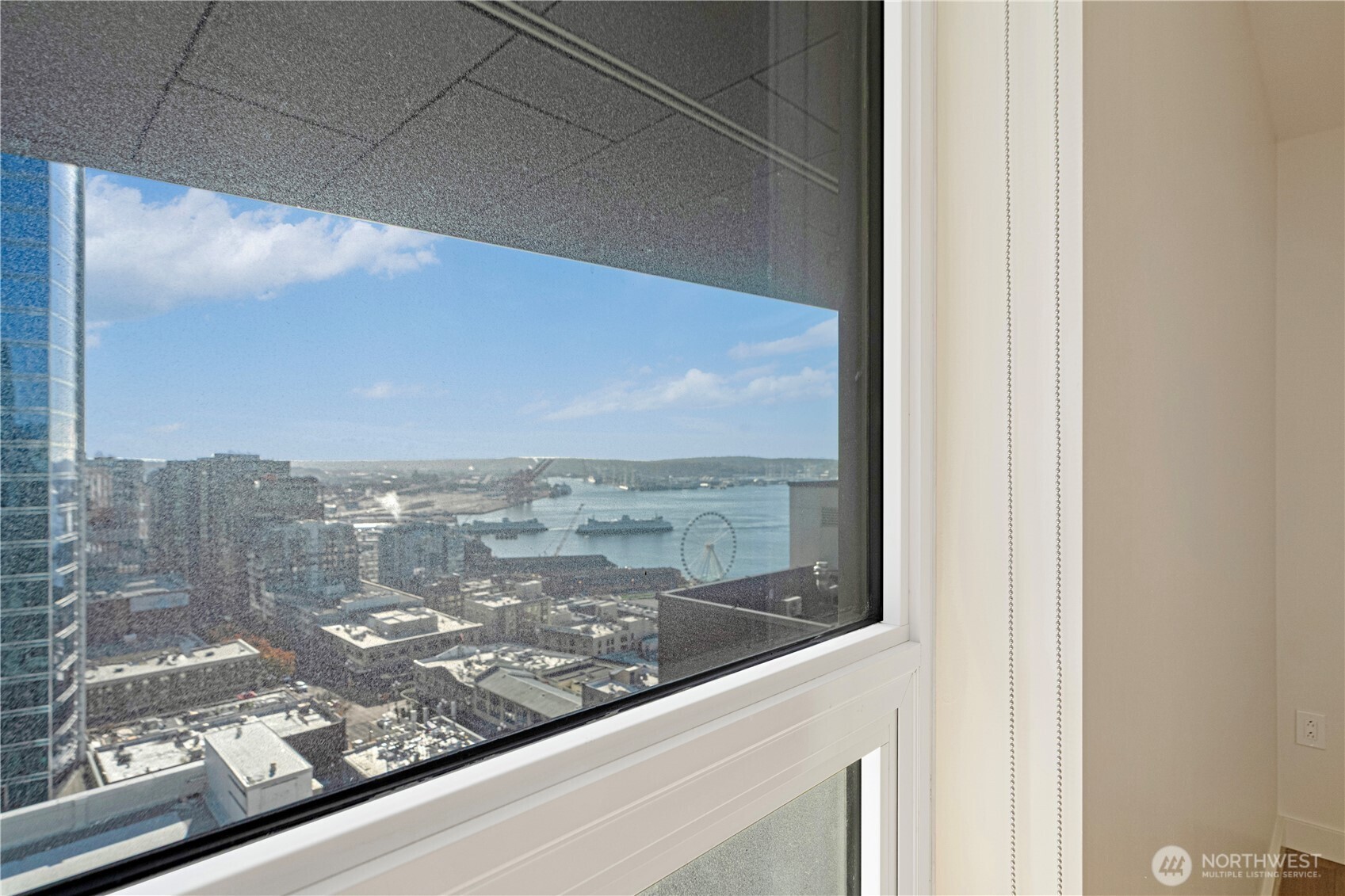 121 Stewart Street, Unit 1605 Seattle, WA 98101 - Photo 14 of 38 a view of sky from window