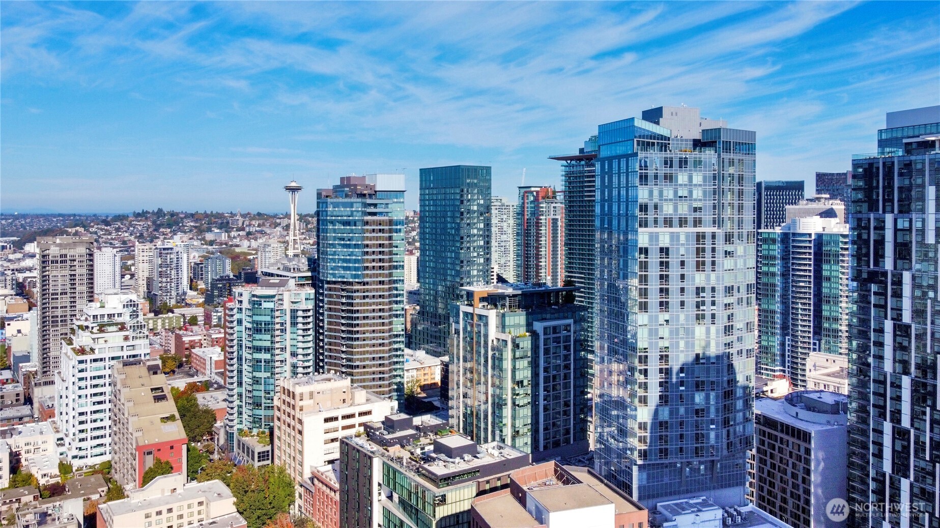 121 Stewart Street, Unit 1605 Seattle, WA 98101 - Photo 31 of 38 a city view with tall buildings