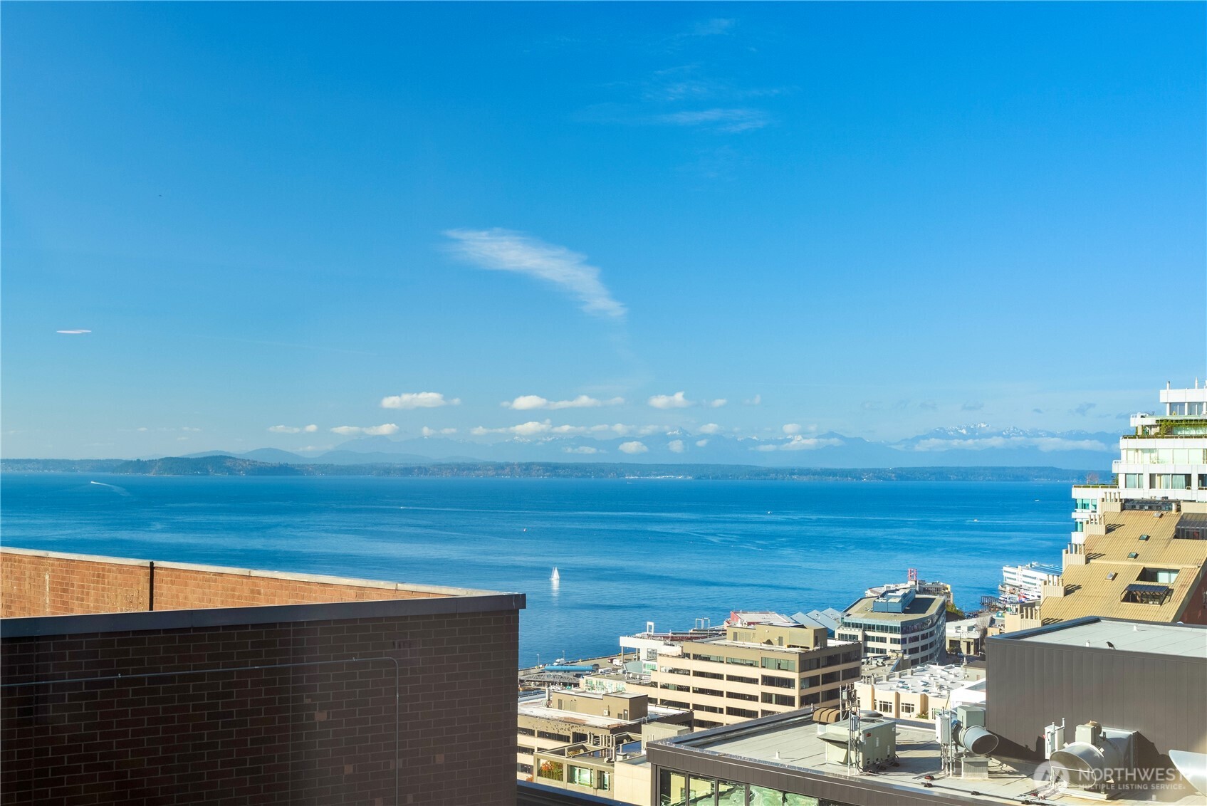 121 Stewart Street, Unit 1605 Seattle, WA 98101 - Photo 6 of 38 a view of a ocean from a terrace