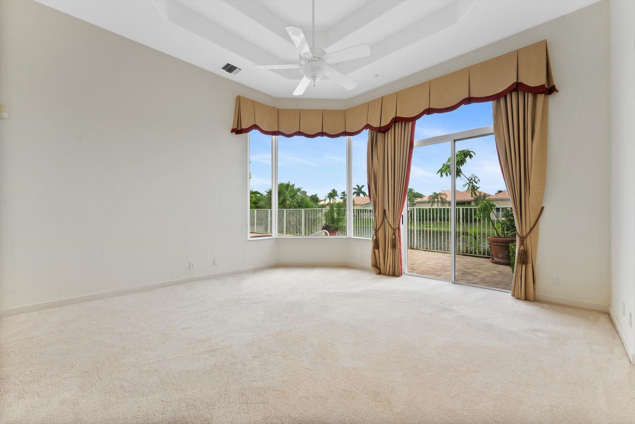 7081 Mallorca Crescent Boca Raton, FL 33433 - Photo 9 of 26 a view of an empty room with a window