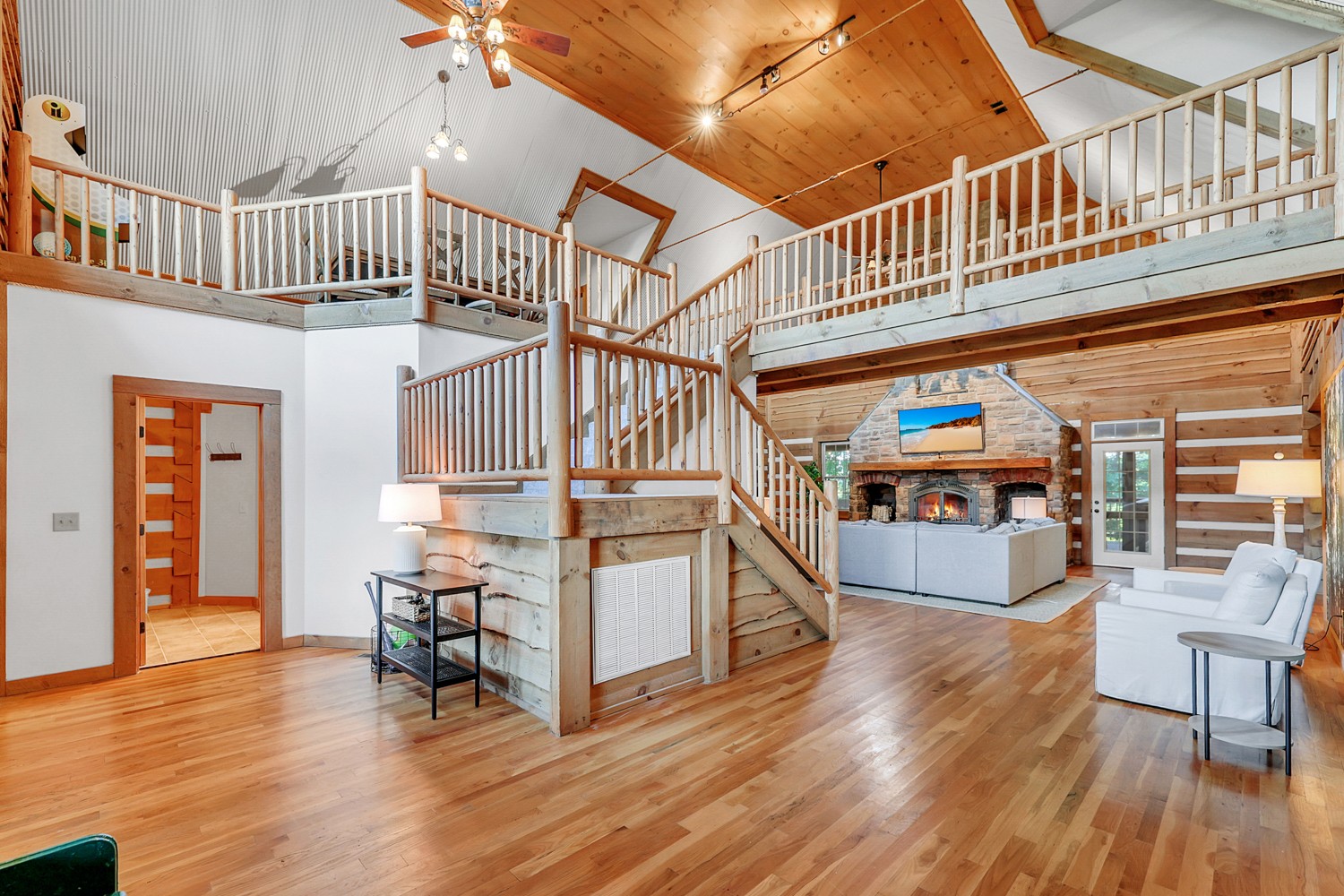 8265 Guthrie Road Cross Plains, TN 37049 - Photo 25 of 83 a view of entryway dining room and hall with wooden floor
