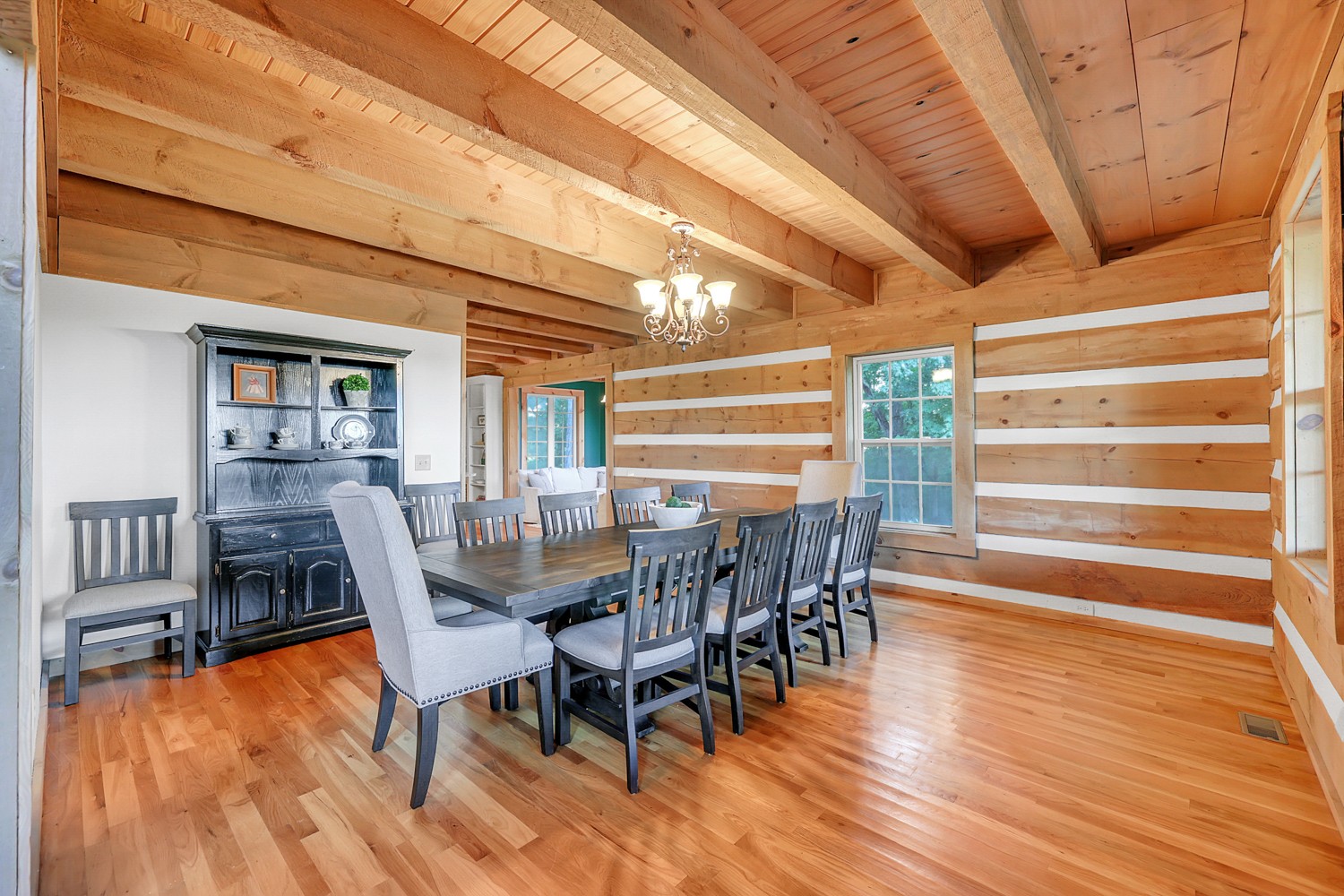 8265 Guthrie Road Cross Plains, TN 37049 - Photo 33 of 83 a view of a dining room with furniture and wooden floor