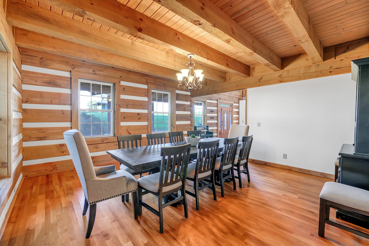 8265 Guthrie Road Cross Plains, TN 37049 - Photo 34 of 83 a view of a dining room with furniture and wooden floor