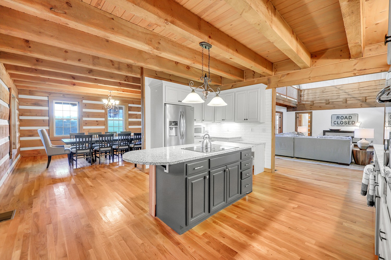 8265 Guthrie Road Cross Plains, TN 37049 - Photo 36 of 83 a large kitchen with stainless steel appliances granite countertop a large counter top a stove and a wooden floors