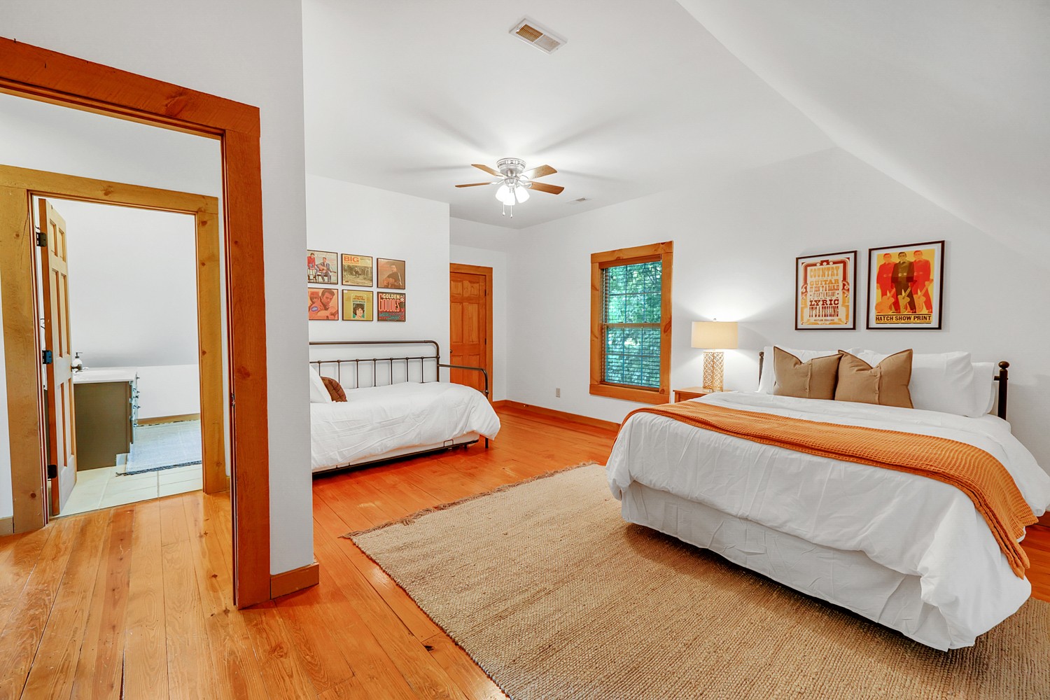 8265 Guthrie Road Cross Plains, TN 37049 - Photo 52 of 83 a spacious bedroom with a bed and a view of living room