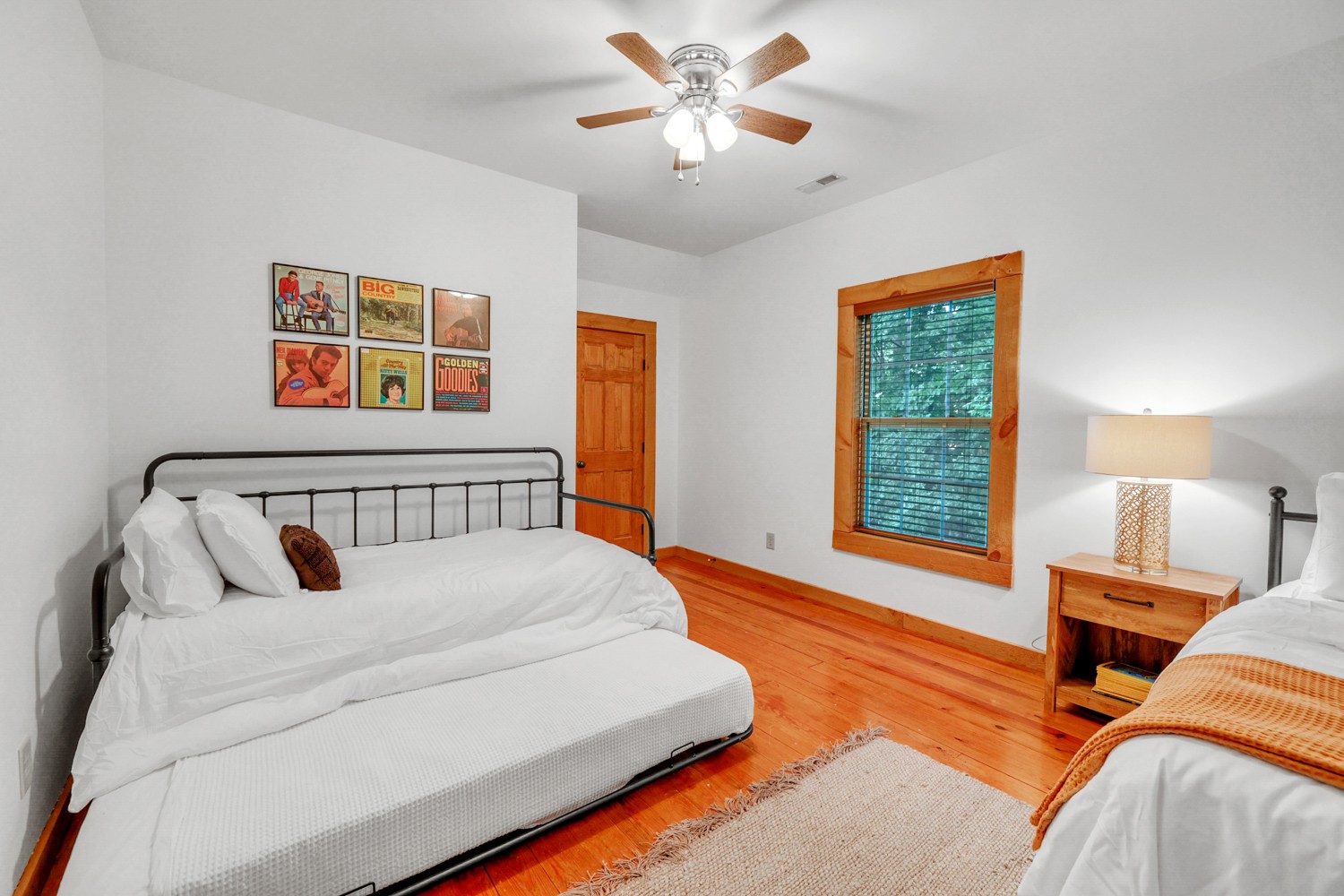 8265 Guthrie Road Cross Plains, TN 37049 - Photo 54 of 83 a bed sitting in a bedroom next to a window