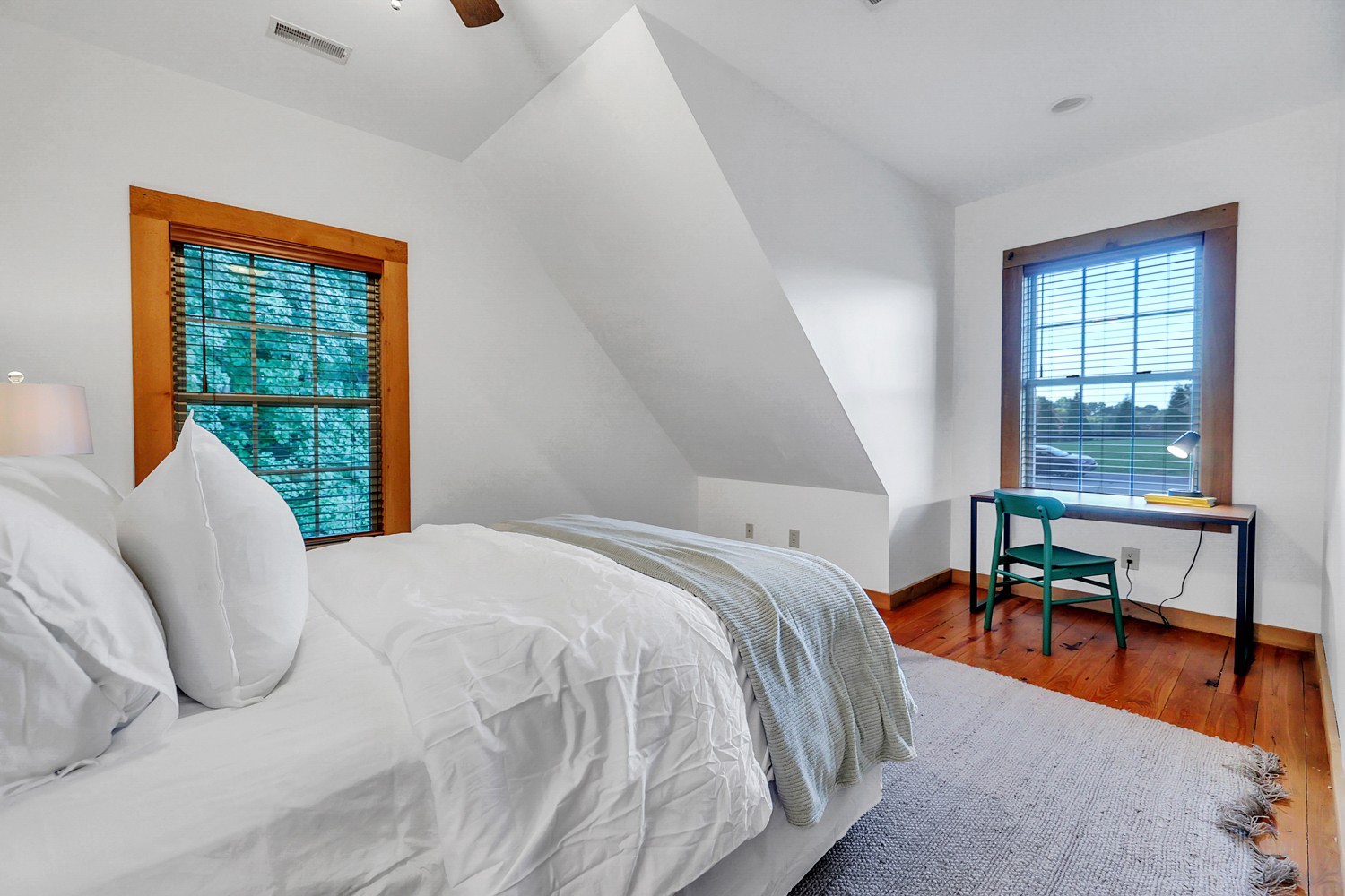 8265 Guthrie Road Cross Plains, TN 37049 - Photo 56 of 83 a bedroom with a bed and a table next to a window