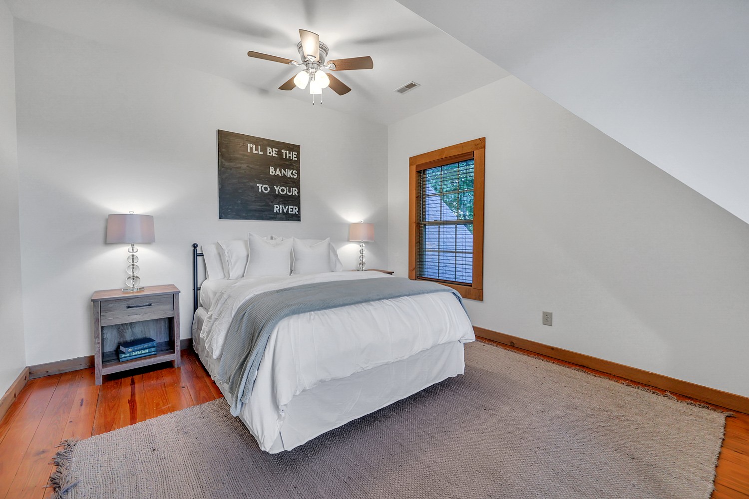 8265 Guthrie Road Cross Plains, TN 37049 - Photo 57 of 83 a bedroom with a bed and a chandelier