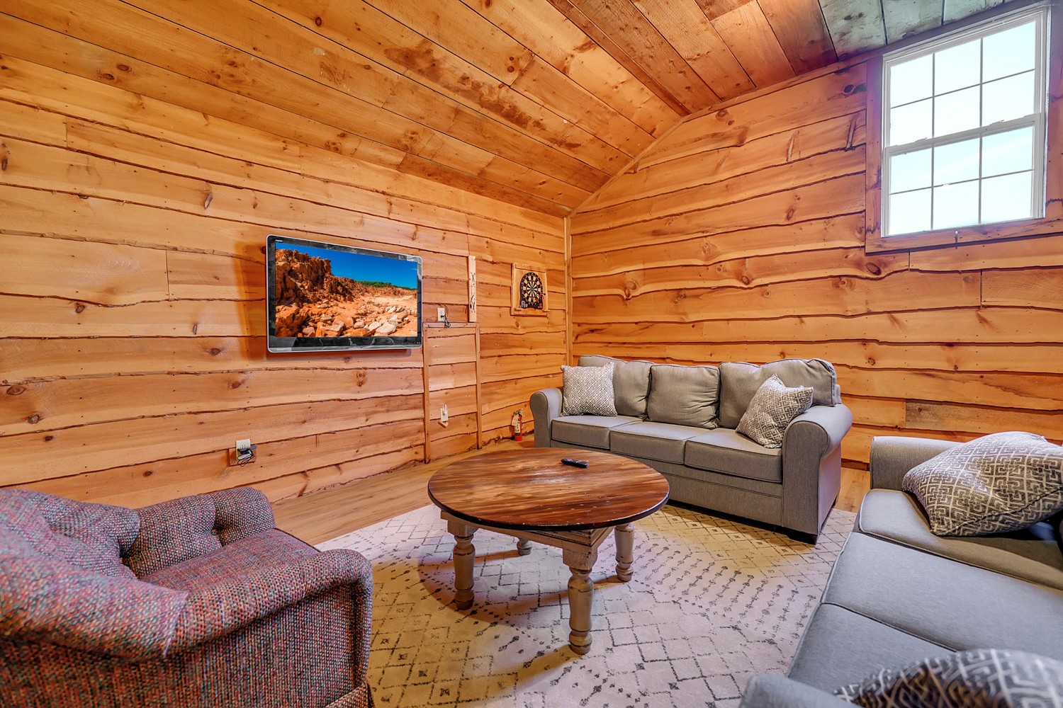 8265 Guthrie Road Cross Plains, TN 37049 - Photo 66 of 83 a living room with furniture and a rug