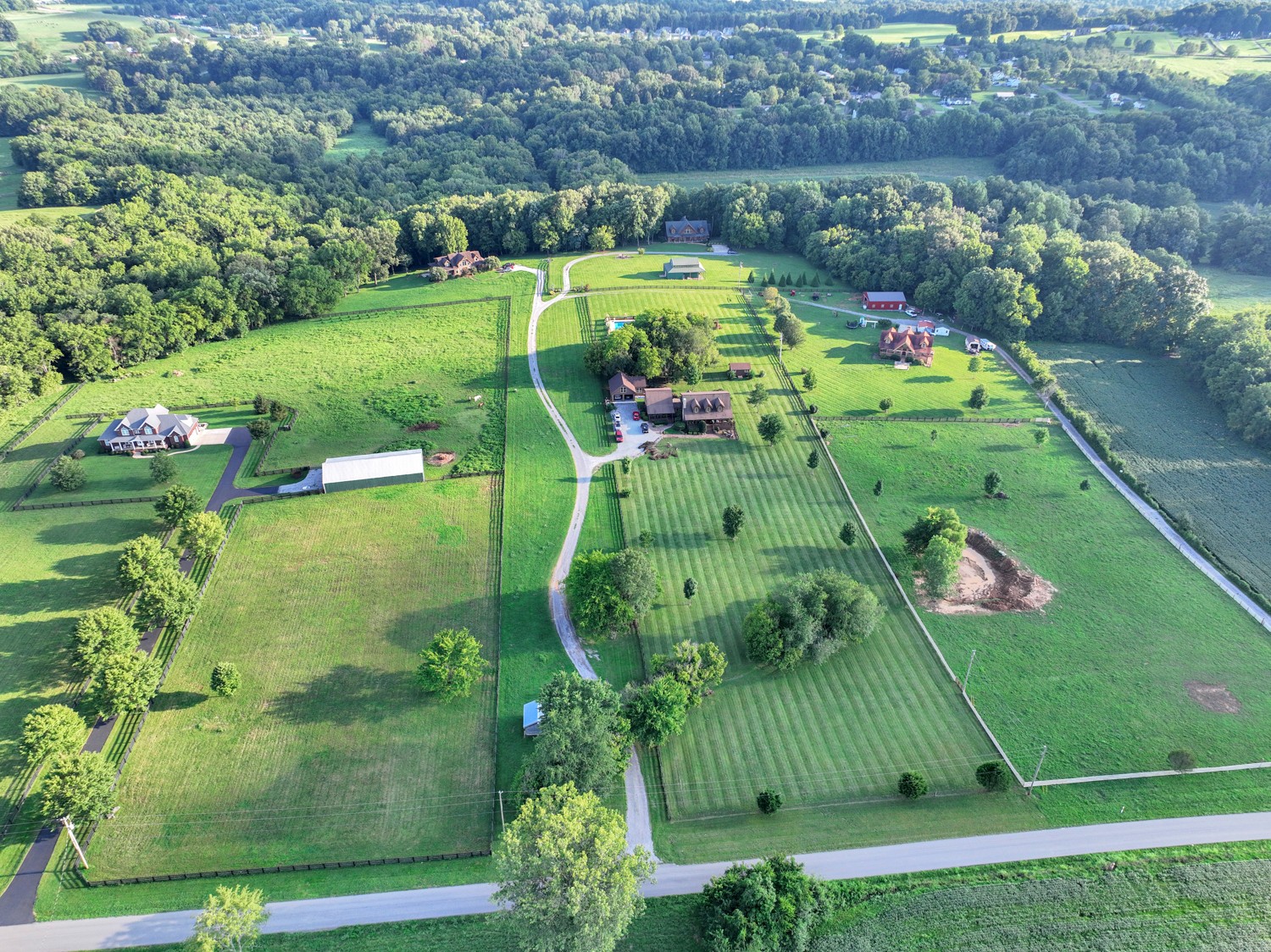 8265 Guthrie Road Cross Plains, TN 37049 - Photo 76 of 83 an aerial view of a golf course with parking space