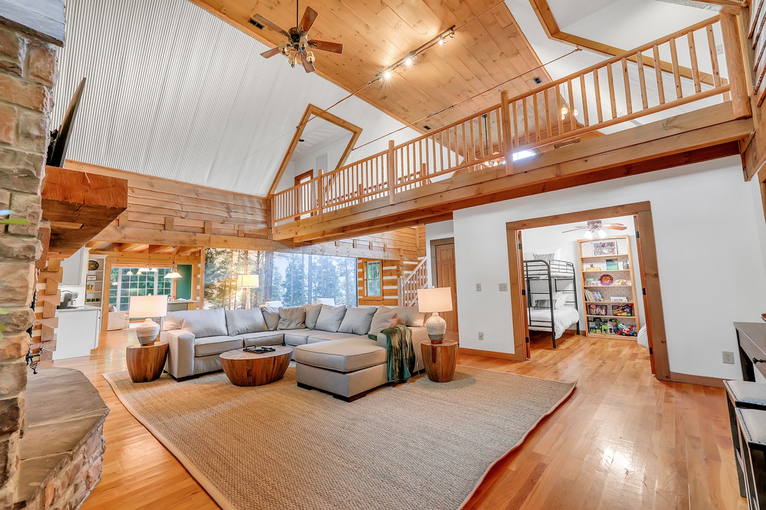 8265 Guthrie Road Cross Plains, TN 37049 - Photo 8 of 83 a living room with furniture a couch and dresser with wooden floor
