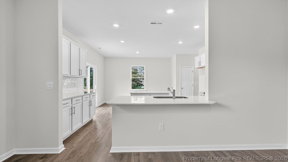 194 Fair Child Road Spring Lake, NC 28390 - Photo 12 of 33 a view of kitchen with wooden floor