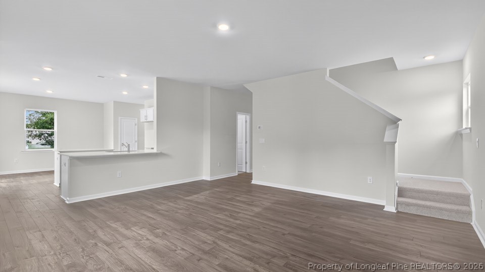 194 Fair Child Road Spring Lake, NC 28390 - Photo 15 of 33 a view of empty room with wooden floor and window